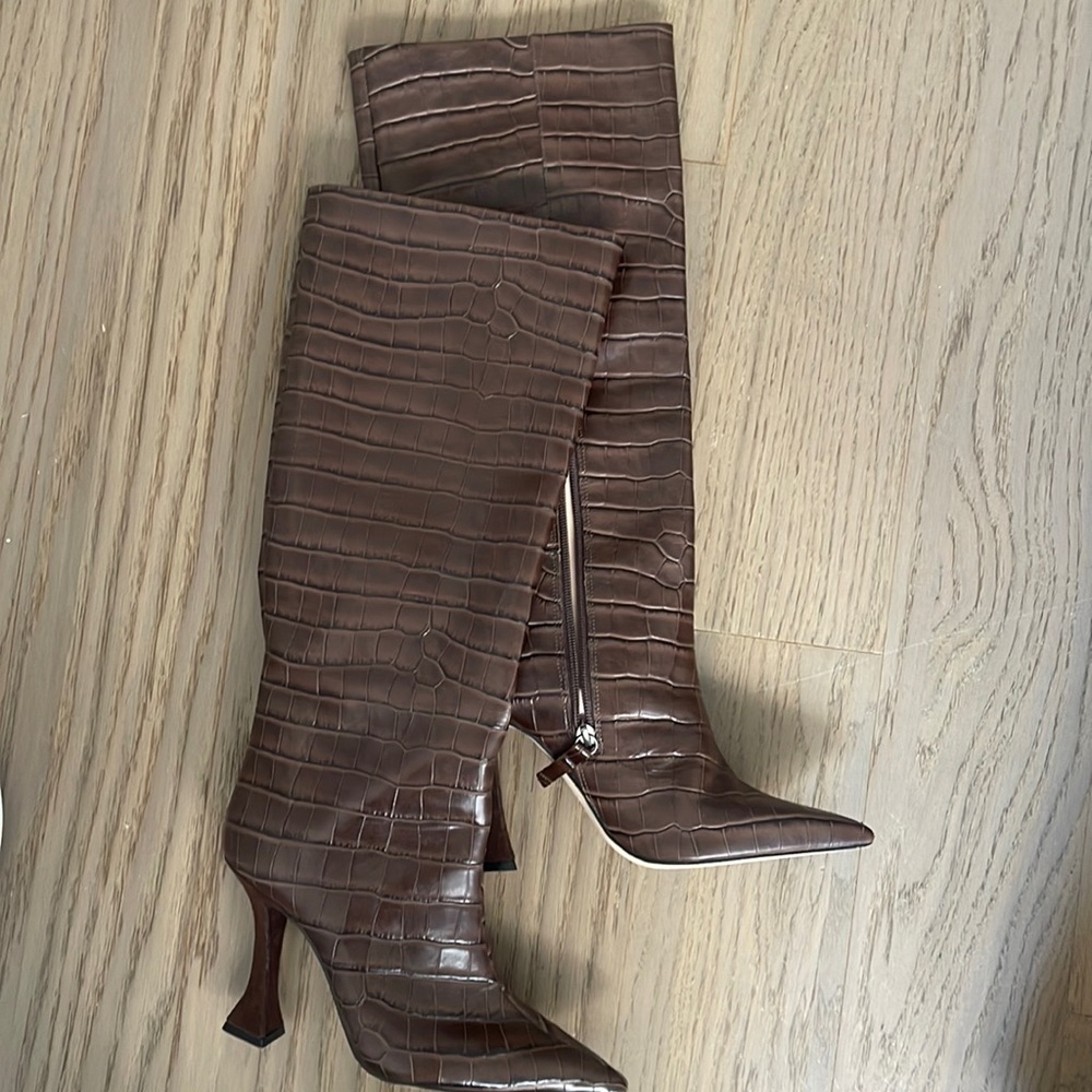 Snake skin heeled boots